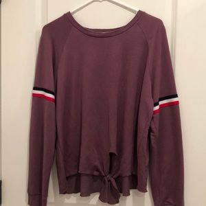 Purple long sleeved shirt with stripes on arms